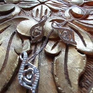 Diamond platinum over sterling pendant / earrings